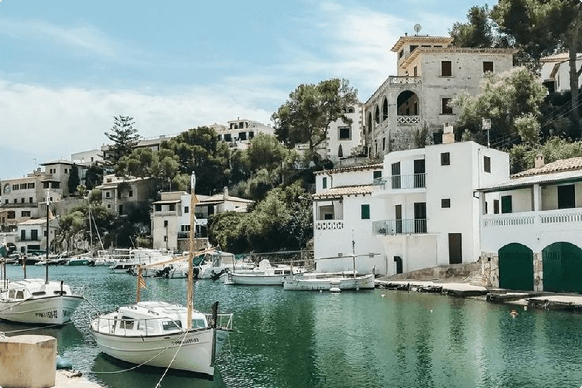 Scenic harbour view and Mediterranean homes in Porto Colom